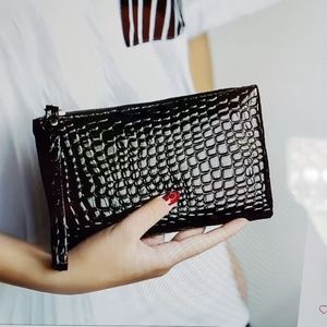 Elegant Black Crocodile-Embossed Wristlet